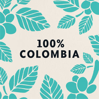 A graphic design reading ONE HUNDRED PERCENT COLOMBIA, surrounded by illustrations of teal coffee plants on a cream background.