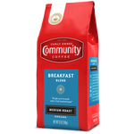 A twelve-ounce bag of ground Community Coffee Breakfast Blend medium roast, rotated a quarter-turn to the left.