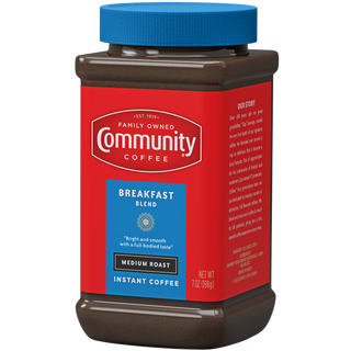 A seven-ounce jar of instant Community Coffee Breakfast Blend medium roast, rotated a quarter-turn to the left.
