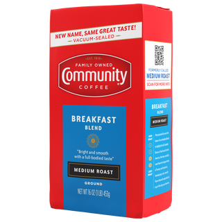 A sixteen-ounce bag of ground, vacuum-sealed Community Coffee Breakfast Blend medium roast, rotated a quarter-turn to the left.
