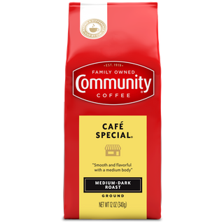 A twelve-ounce bag of ground Community Coffee Café Special medium-dark roast, shown from the front.