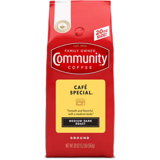 A twenty-ounce bag of ground Community Coffee Café Special medium-dark roast, shown from the front.