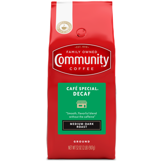 A thirty-two-ounce bag of ground Community Coffee Café Special Decaf medium-dark roast, shown from the front.