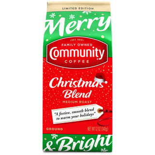 A twelve-ounce bag of ground Community Coffee Christmas Blend medium roast, shown from the front.