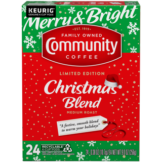A twenty-four-count box of Community Coffee Christmas Blend medium roast K-Cups, shown from the front.