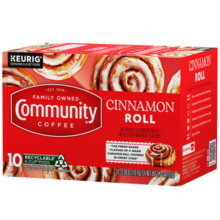 A ten-count box of Community Coffee Cinnamon Roll flavored coffee K-Cups, rotated a quarter-turn to the left.
