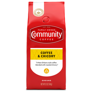 A twelve-ounce bag of ground Community Coffee, Coffee and Chicory, shown from the front.
