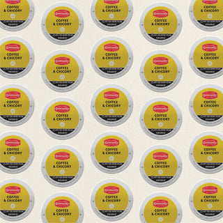 Rows of K-Cup lids for Community Coffee, Coffee and Chicory medium-dark roast, lie flat against a white background.