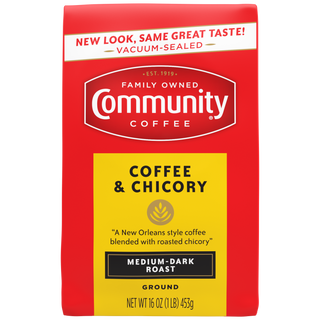 A sixteen-ounce bag of ground, vacuum-sealed Community Coffee, Coffee and Chicory medium-dark roast, shown from the front.