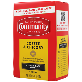 A sixteen-ounce bag of ground, vacuum-sealed Community Coffee, Coffee and Chicory medium-dark roast, rotated a quarter-turn to the left.