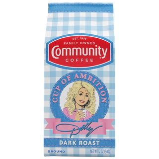 A twelve-ounce bag of Cup of Ambition Dark Roast ground coffee, crafted in partnership between Dolly Parton and Community Coffee, shown from the front.