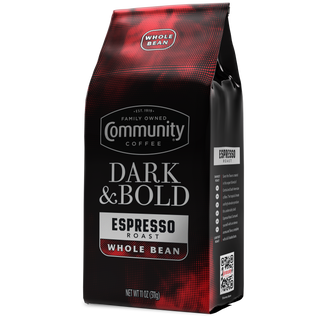 An eleven-ounce bag of whole bean Community Coffee Dark & Bold Espresso Roast, rotated a quarter-turn to the left.