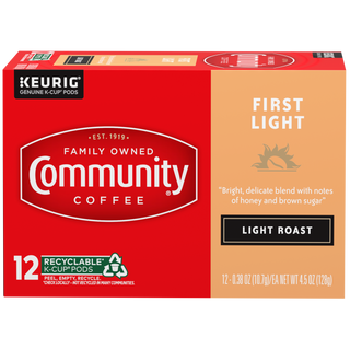A twelve-count box of Community Coffee First Light, light roast K-Cups, shown from the front.