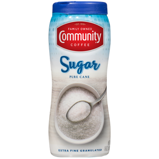 A sixteen-ounce canister of Community Coffee granulated sugar, shown from the front.
