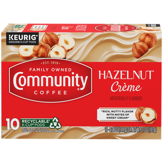 A ten-count box of Community Coffee Hazelnut Crème flavored coffee K-Cups, shown from the front.