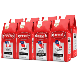 A set of eight ground Community Coffee American Classic medium roast twelve-ounce bags, rotated a quarter-turn to the left and bundled for the Military Match program.