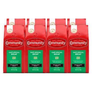 A set of eight ground Community Coffee Café Special Decaf medium-dark roast twelve-ounce bags, shown from the front and bundled for the Military Match program.