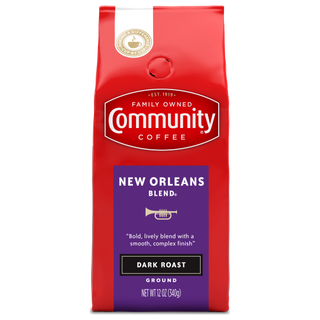 A twelve-ounce bag of ground Community Coffee New Orleans Blend dark roast, shown from the front.