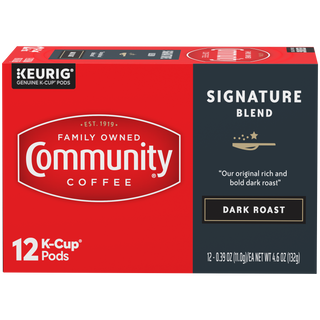 A twelve-count box of Community Coffee Signature Blend dark roast K-Cups, shown from the front.
