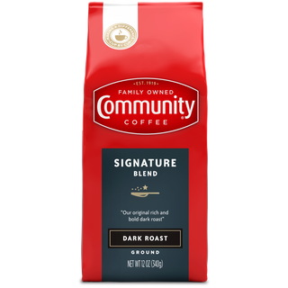 A twelve-ounce bag of ground Community Coffee Signature Blend dark roast, shown from the front.