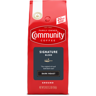 A twenty-ounce bag of ground Community Coffee Signature Blend dark roast, shown from the front.