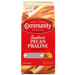 A twelve-ounce bag of ground Community Coffee Southern Pecan Praline flavored coffee, shown from the front.