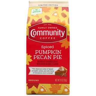 An eleven-ounce bag of ground Community Coffee Spiced Pumpkin Pecan Pie flavored coffee, shown from the front.